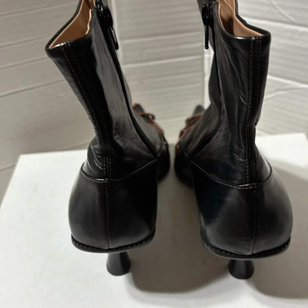 Elegant Black Ankle Boots with Brown Accents - Picture 7 of 13
